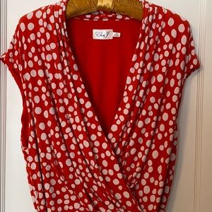 Polka dot faux-wrap shift dress w/ pleat neckline